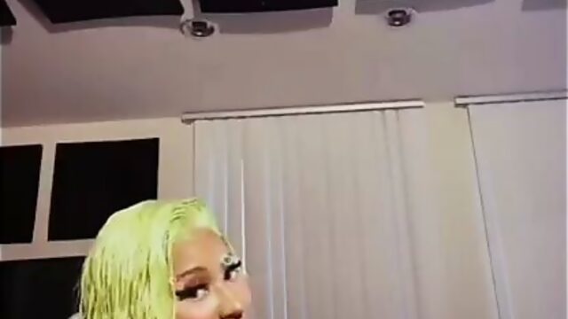 Nicki Minaj playing with her giant boobs, has nipple slip